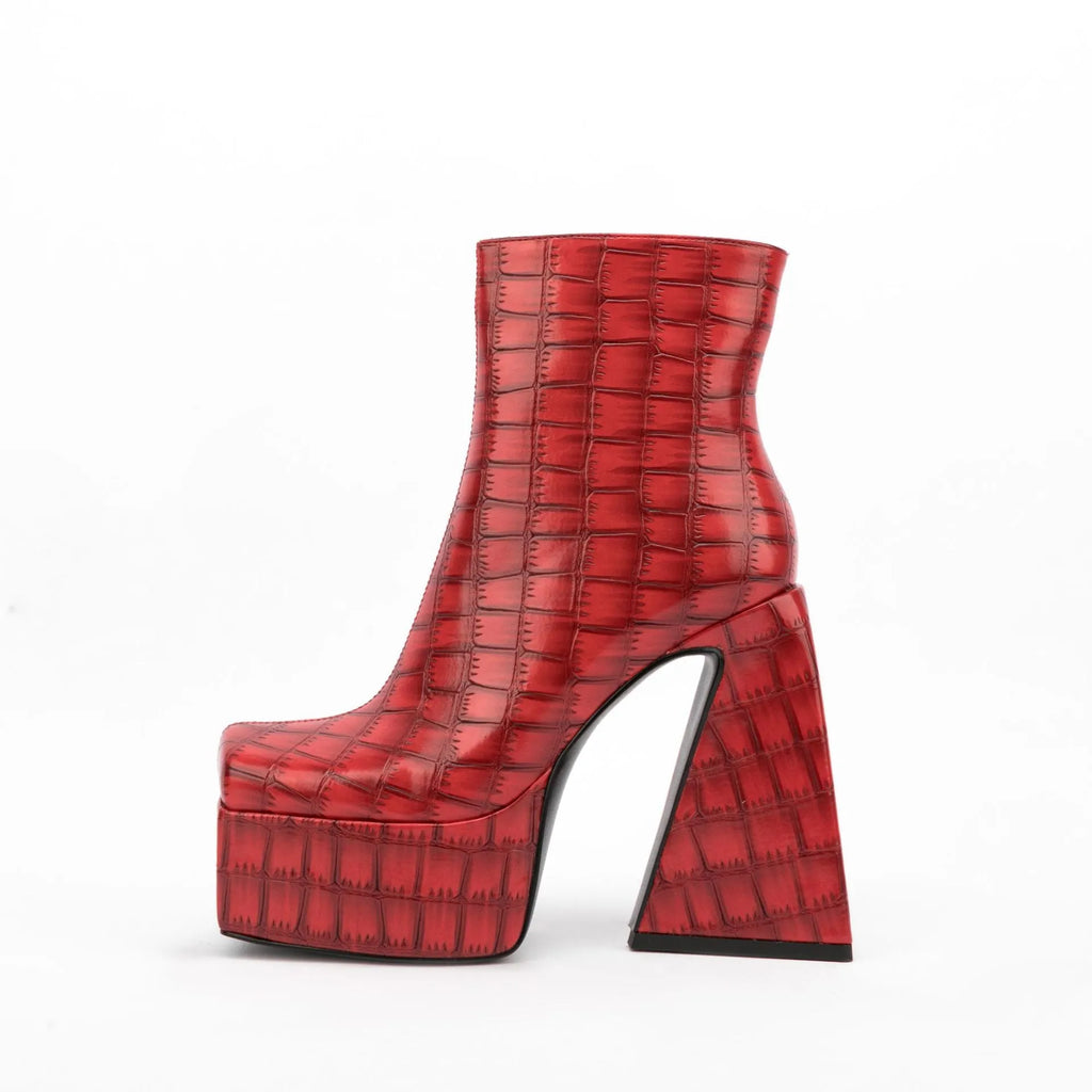 Women's ankle boots with a high heel in artificial PU leather, shown in a choice of colours.