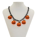 Mixed colour ghost pumpkin acrylic necklace on a regular chain, cartoon Halloween styling.