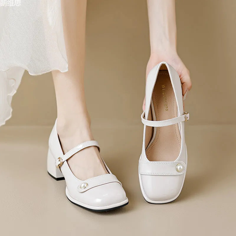 Women's patent leather chunky heel pump in apricot with square toe and buckle closure