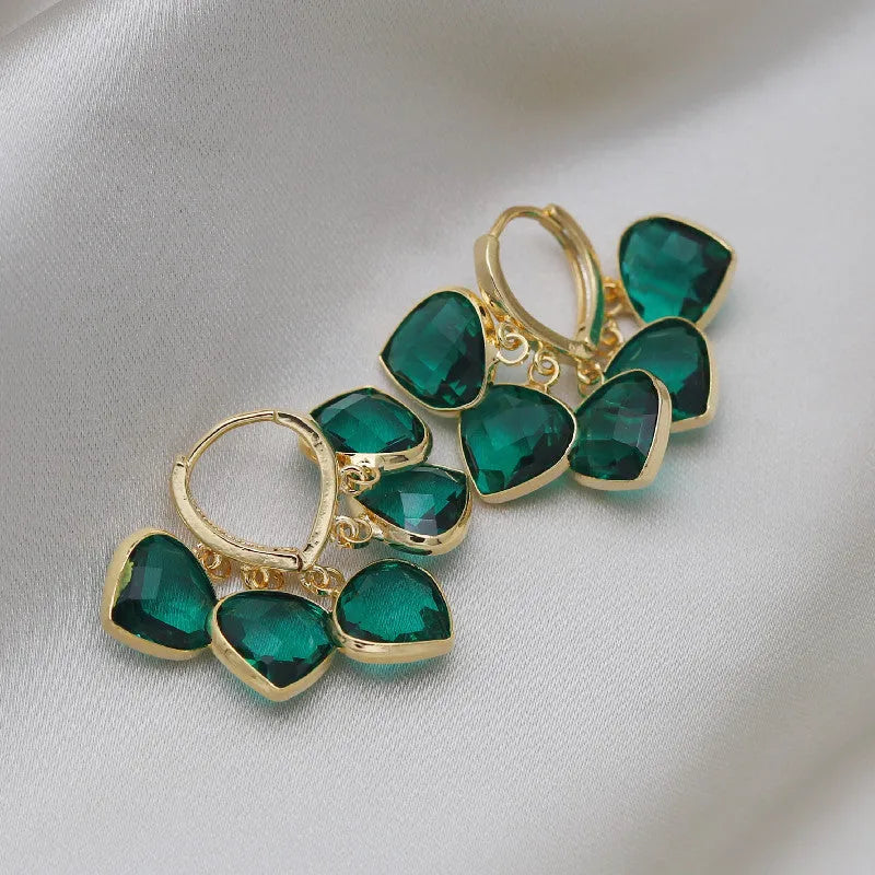 Korean style green heart glass ear clip earrings with dancing pendant design