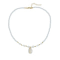 White conch shell necklace for women with a mother of pearl pendant on a regular chain.