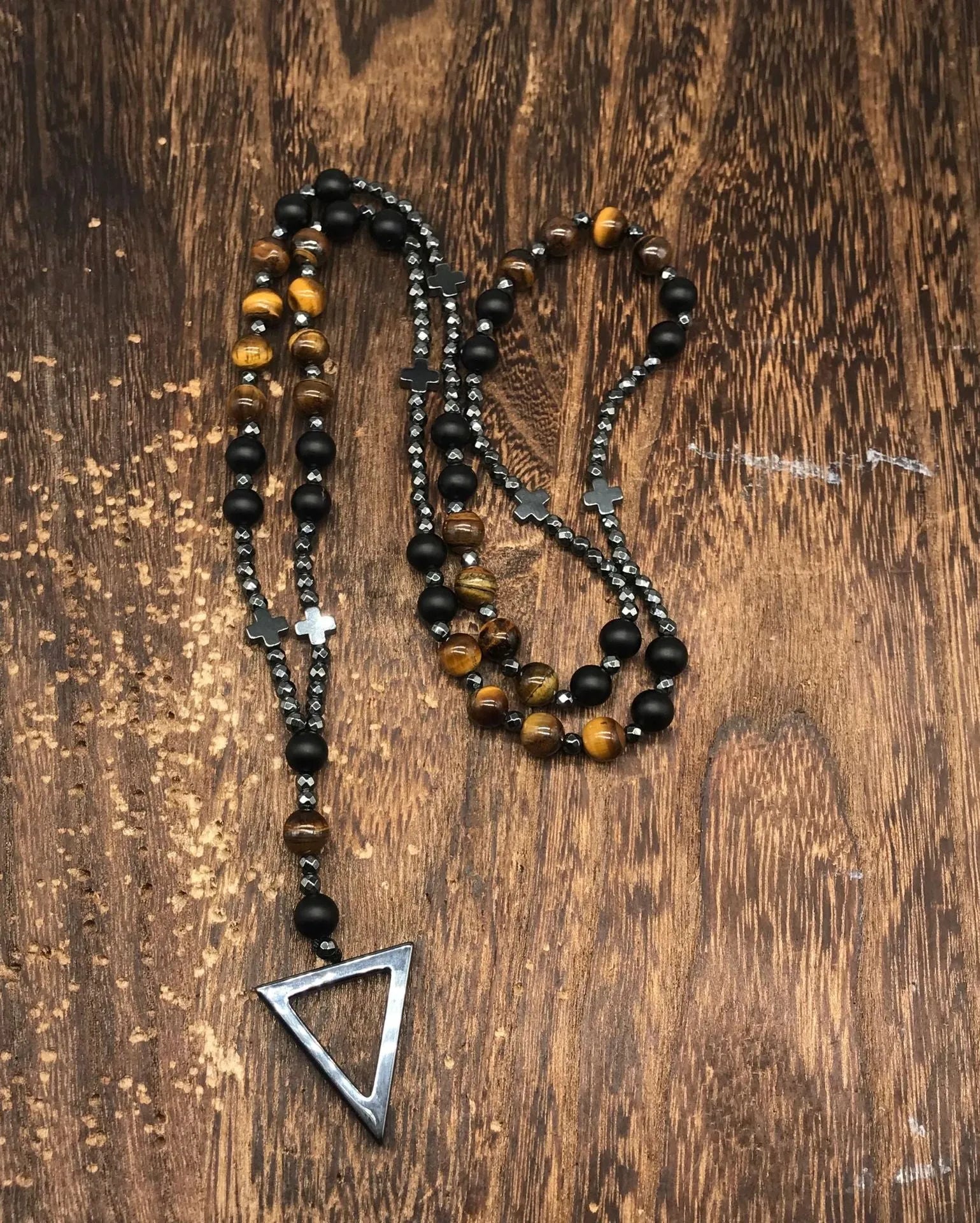 Men's stone cross pendant necklace with hand-woven detail on ball bead chain
