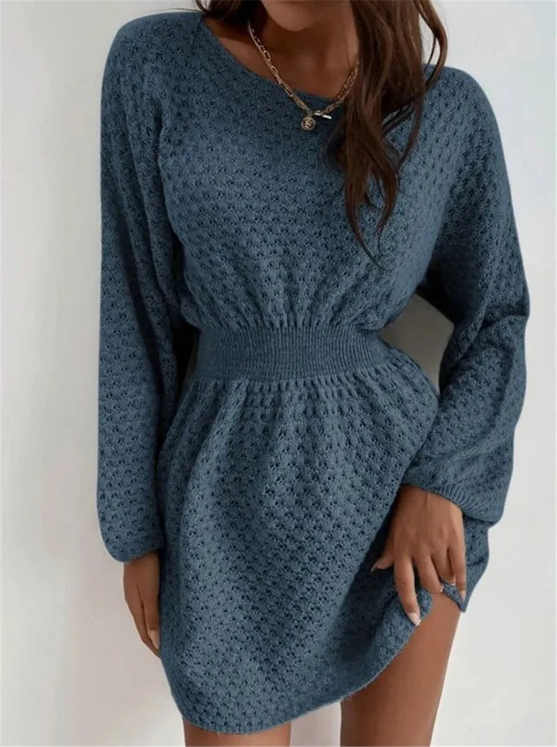 Blue women's knitted dress with hand-crocheted flower decorations and fitted waist