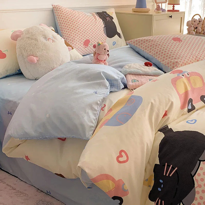 Cartoon anime dog pattern on a pure cotton four-piece bedding set including duvet cover and pillowcases.