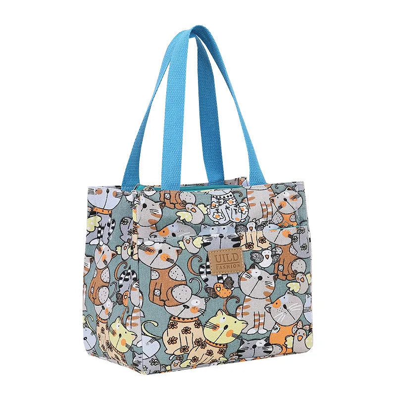 Women's printed canvas handbag with aluminium hardware showing floral design options