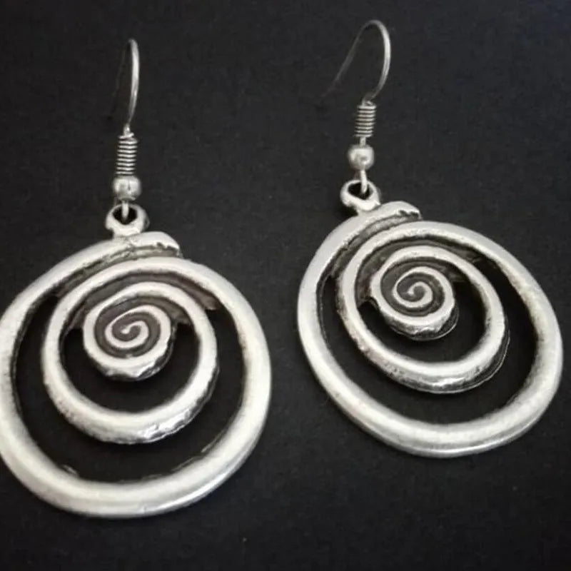 Geometric spiral earrings in distressed silver with national style design elements