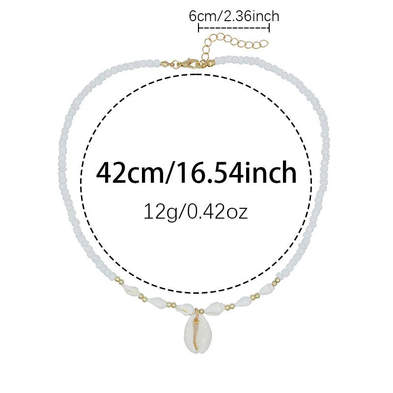 White conch shell necklace for women with a mother of pearl pendant on a regular chain.