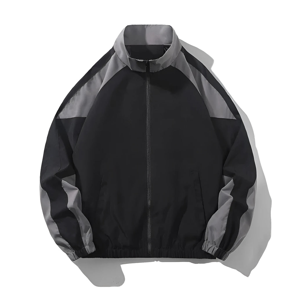Men's black polyester jacket with contrast stitching and side seam pockets on a model