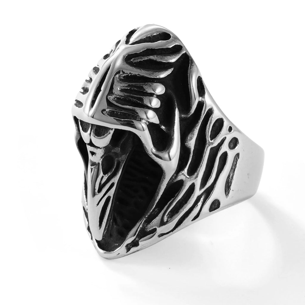 Geometric crow punk ring in titanium steel, MR166 colour, shown on a finger.