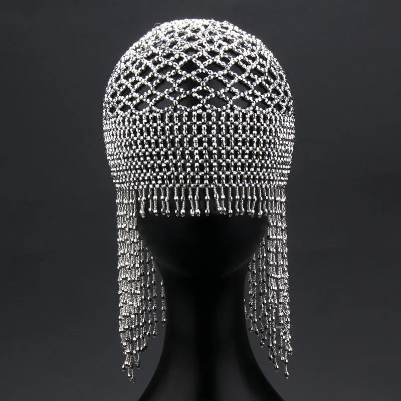 Handmade beaded alloy belly dance hat hair ornament with tassel in silver or black.