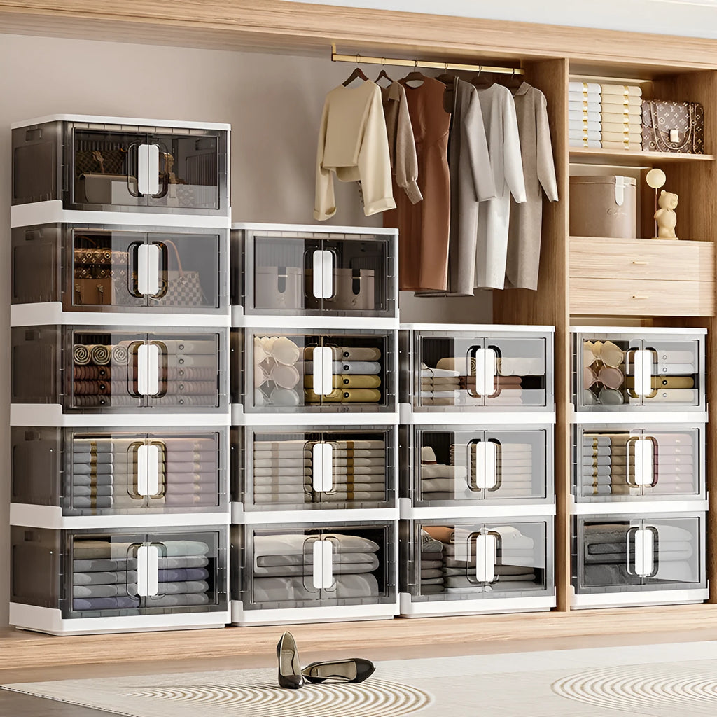 Foldable white household storage locker with wheels and multiple shelves for shoes and toys.