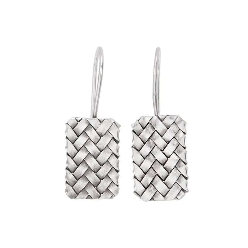Geometric diamond plaid pattern earrings made from silver-coloured 925 silver.