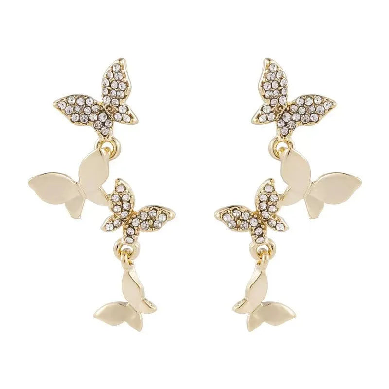 Women's copper butterfly drop earrings with four-butterfly design and gold-coloured finish