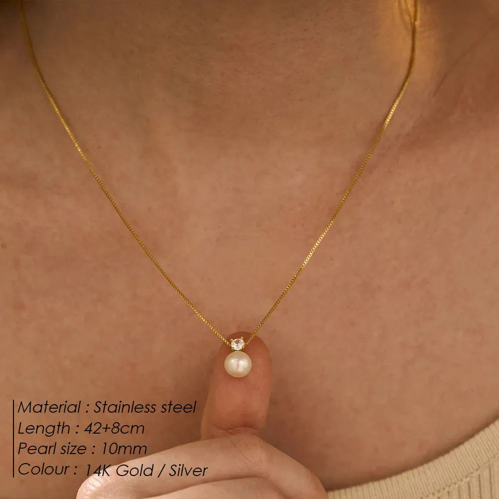 St Delan stainless steel necklace for women with imitation pearl and zircon pendant on a box chain.