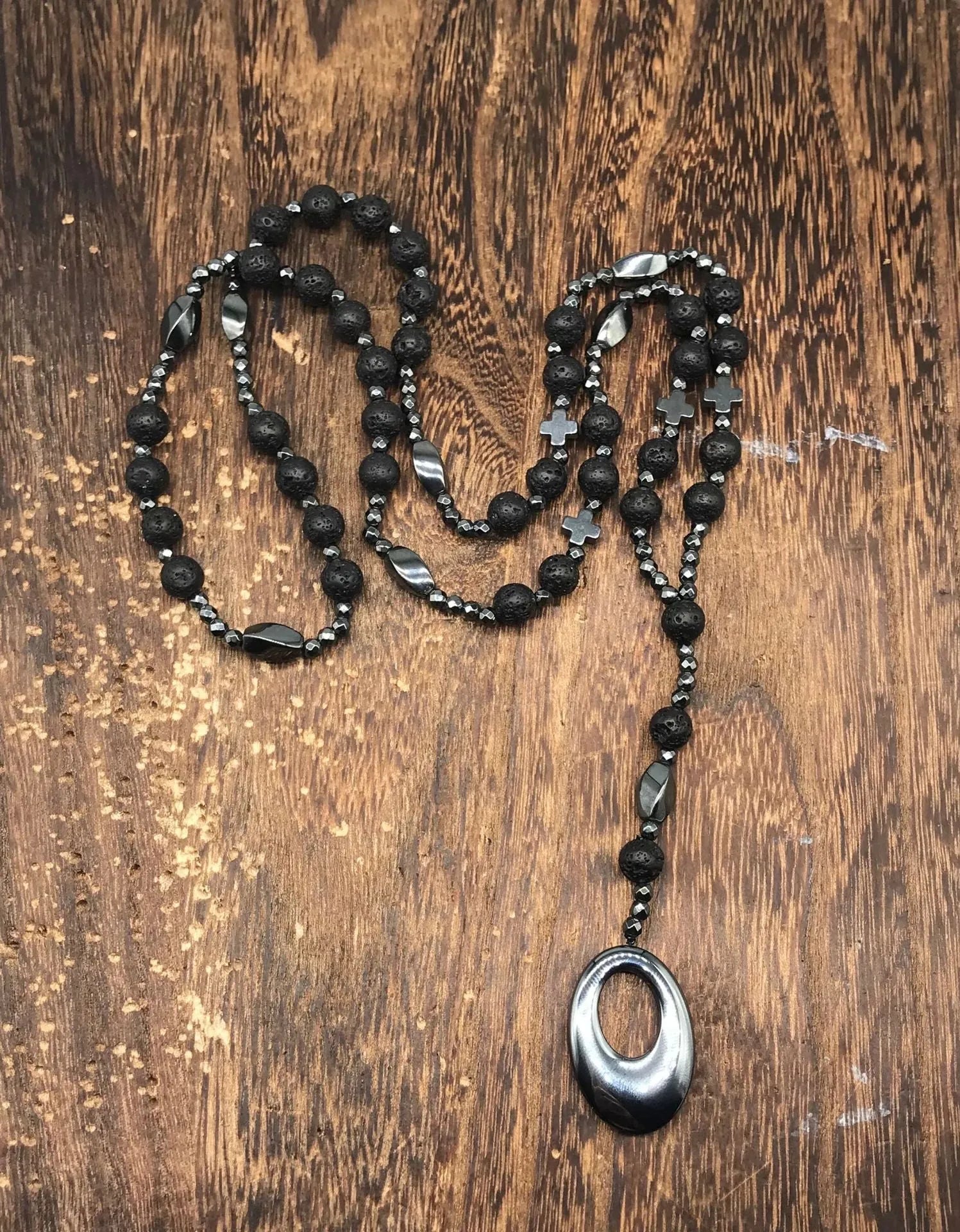 Men's stone cross pendant necklace with hand-woven detail on ball bead chain