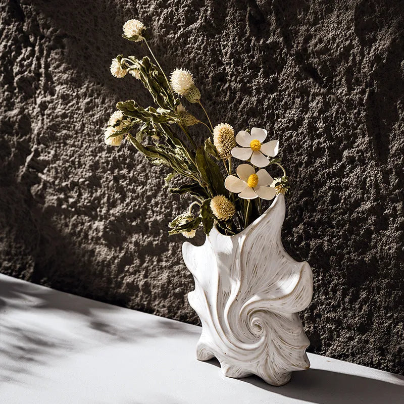 Hexagonal French ceramic vase with coloured glaze in a retro European style.