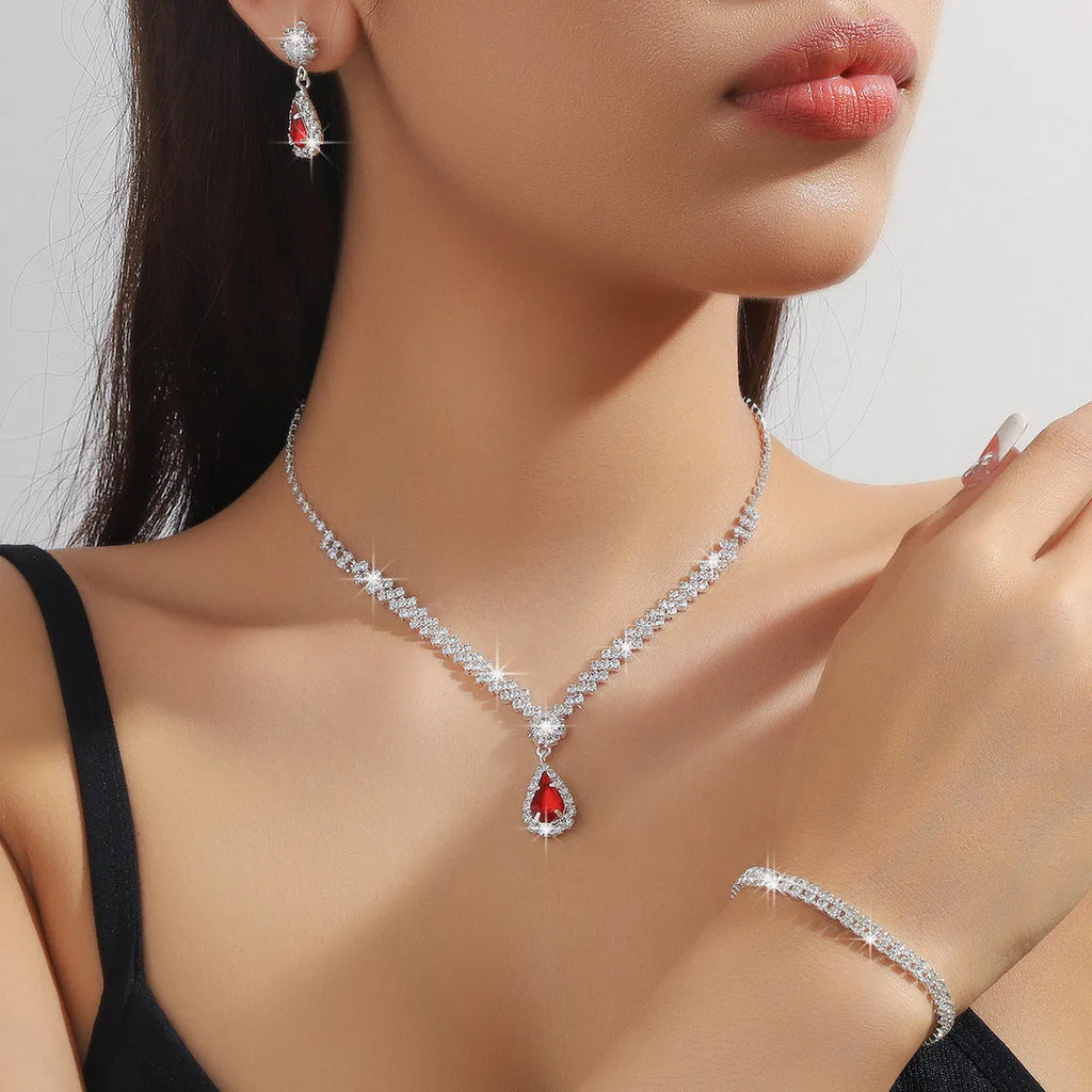 Claw chain rhinestone jewellery set with water drop design in blue, red, green, pink or white colours