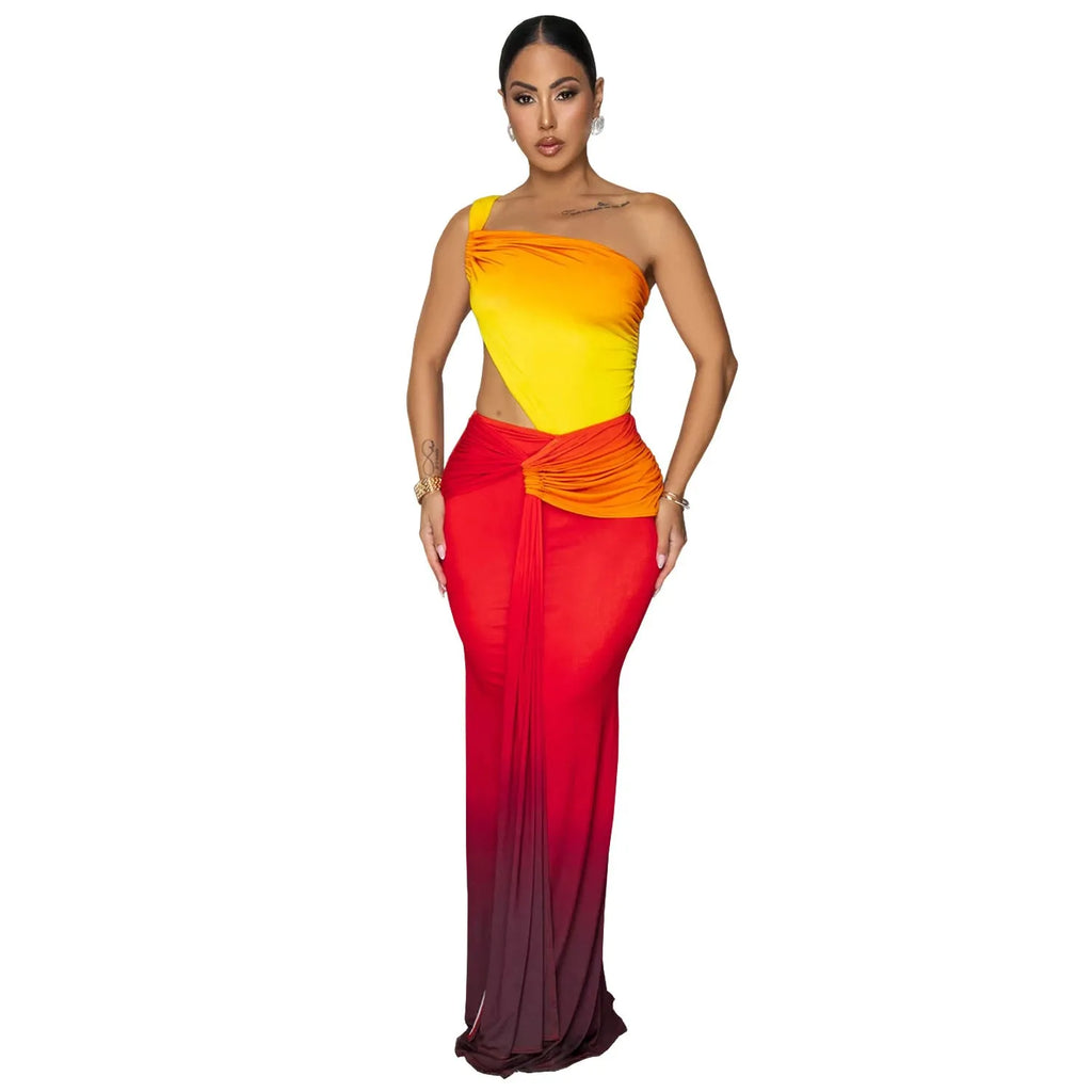 Women's long gradient dress with oblique shoulder and sleeveless design in green.