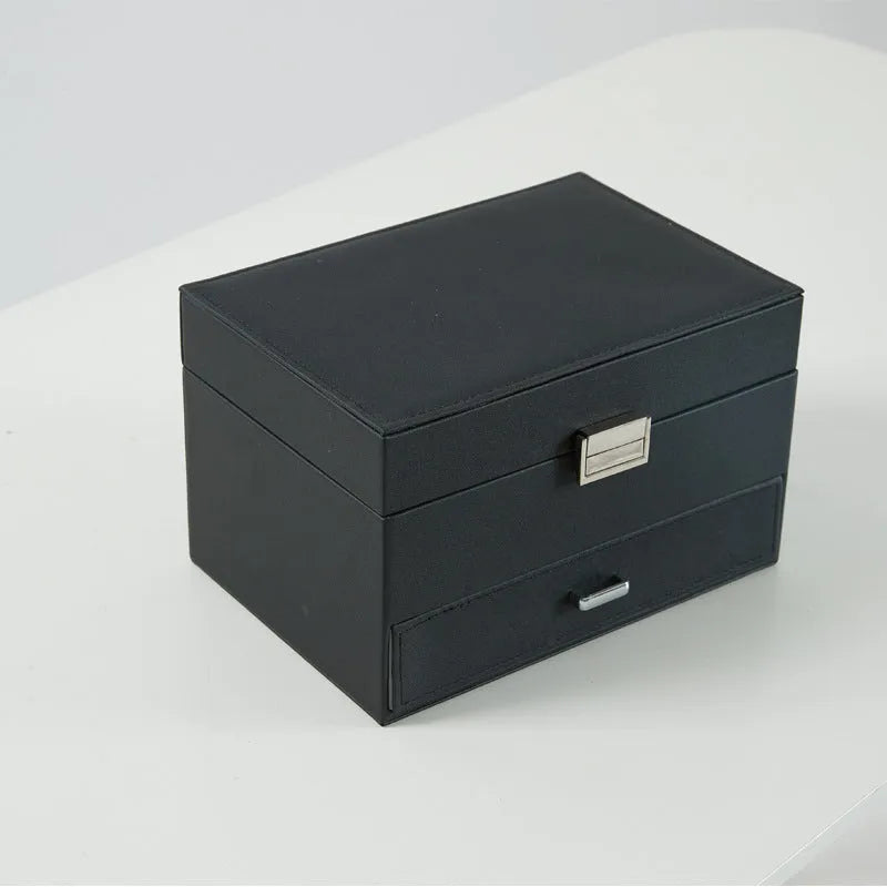 Hard leather jewellery storage box in beige, black, pink, or rose gold colour.