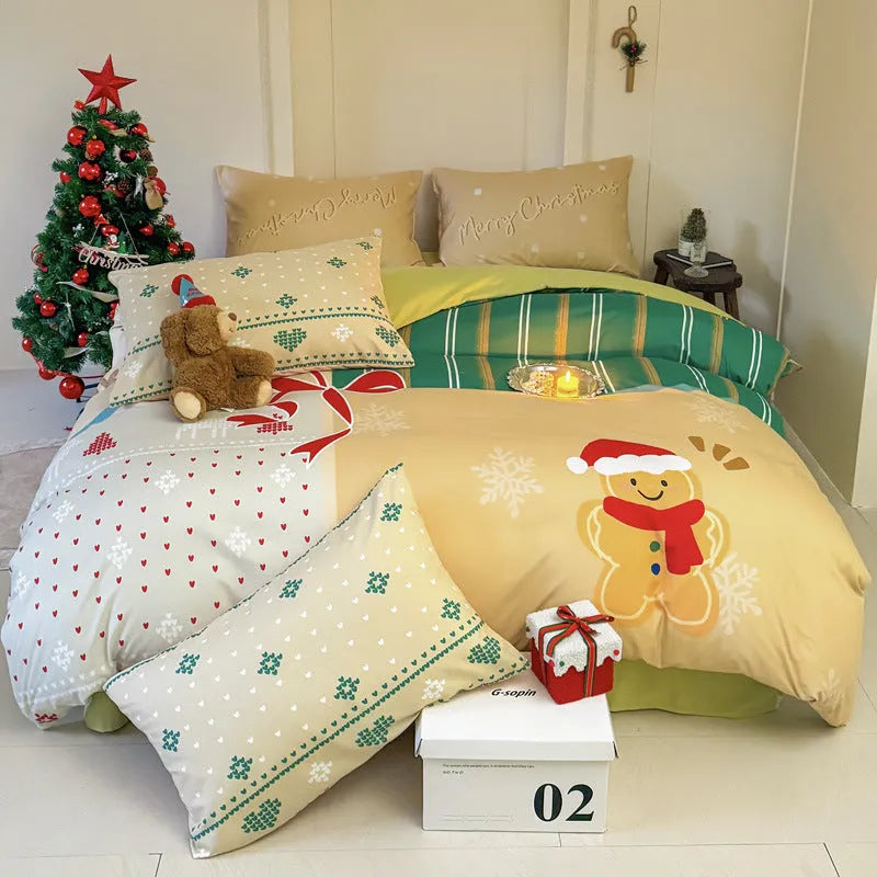 Christmas cartoon print bedding four-piece set on a bed, showing duvet cover and pillowcases.