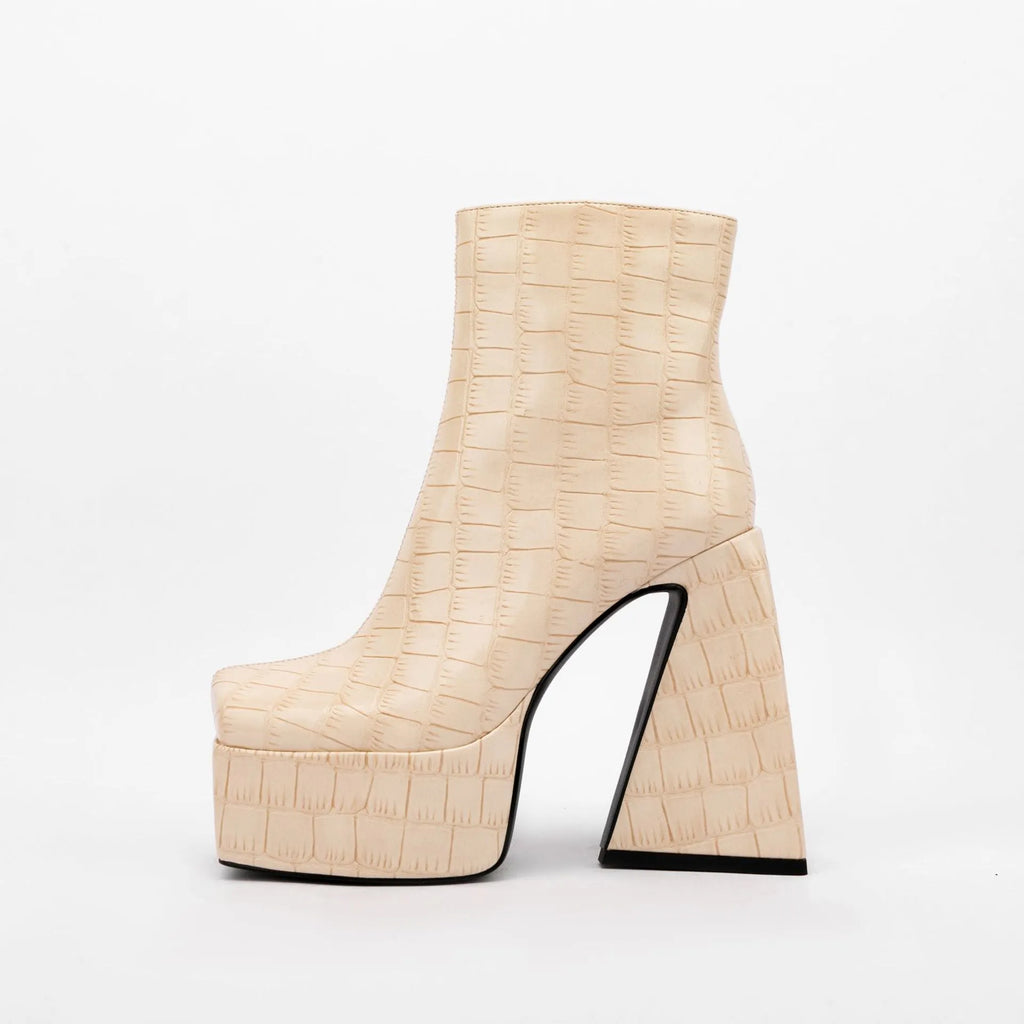 Women's ankle boots with a high heel in artificial PU leather, shown in a choice of colours.