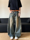 Men's retro blue wide-leg jeans with distressed detailing and machete wash effect