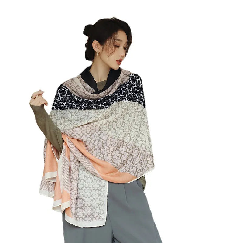 Polyester vintage print scarf draped to show 90x180cm dimensions and decorative pattern