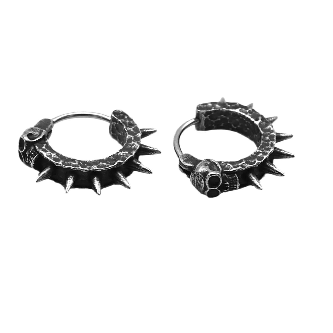 A pair of copper-coloured geometric punk motorcycle earrings with a black retro design on a hook fastening.