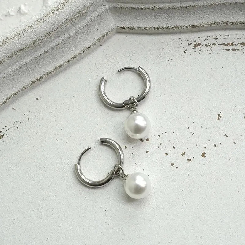 Alloy pearl earrings with geometric round drop design and titanium steel construction