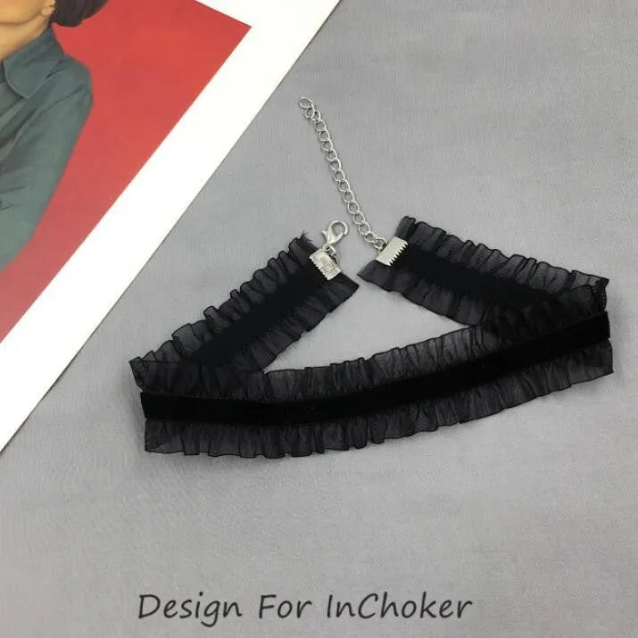 Electroplated alloy necklace with velvet ruffled flower pendant and snake bone chain in three colours.