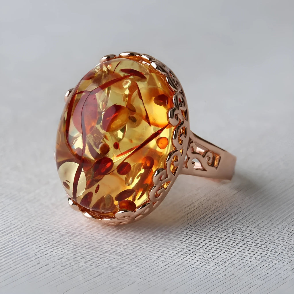 Amber beeswax ring in New Amber Type A colour on alloy band with ethnic retro design