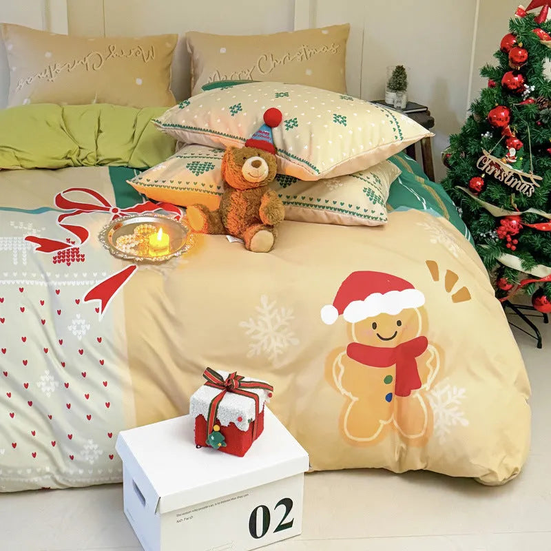 Christmas cartoon print bedding four-piece set on a bed, showing duvet cover and pillowcases.