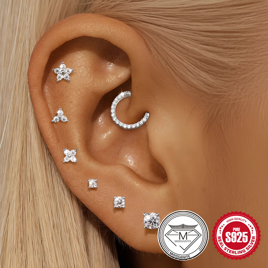 S925 sterling silver stud earrings with petal diamond debris design in platinum colour on white background.