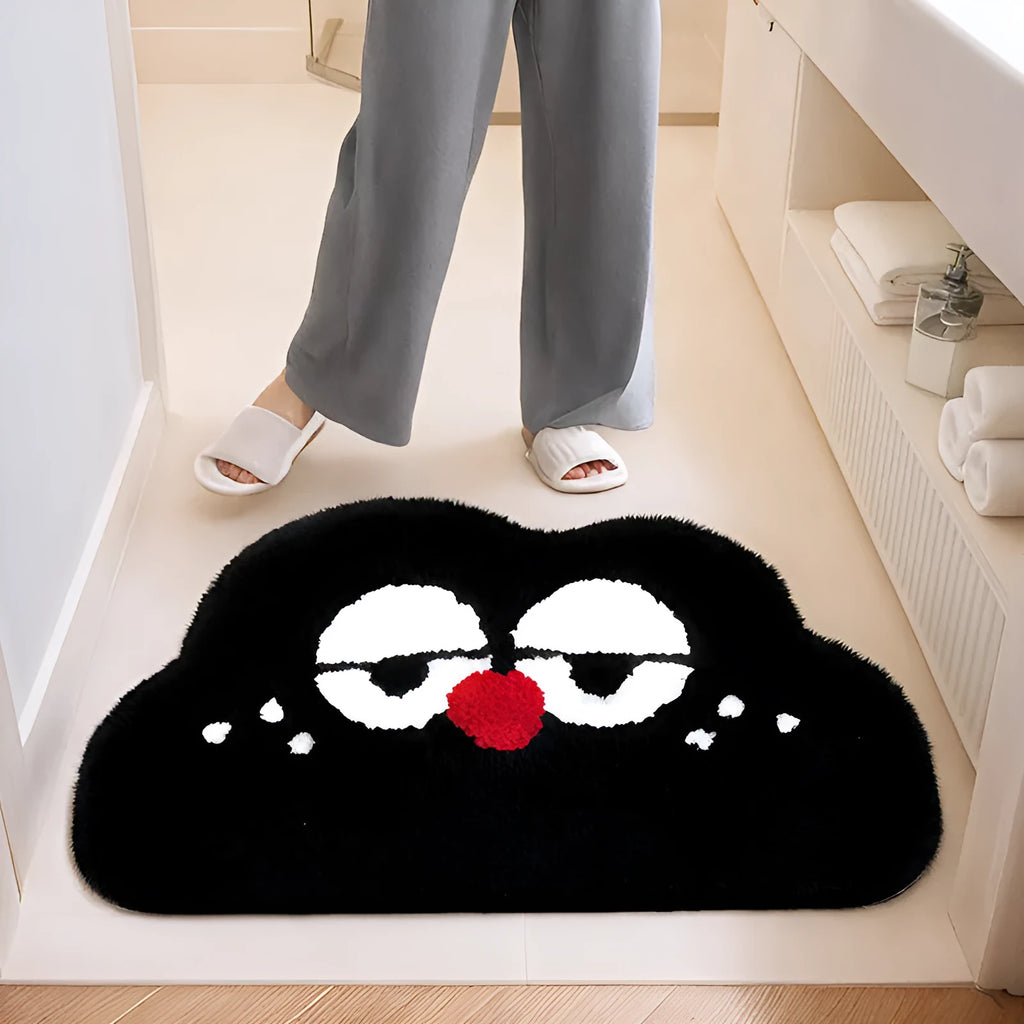 Cartoon anime character printed bathroom mat in green, blue, pink, black, or white, available in three sizes.