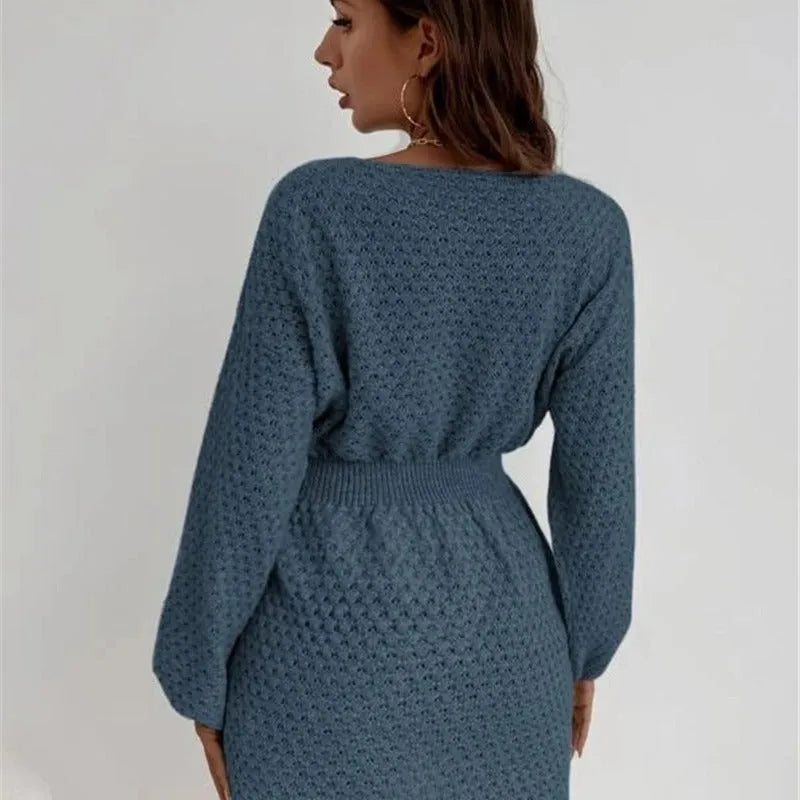 Blue women's knitted dress with hand-crocheted flower decorations and fitted waist