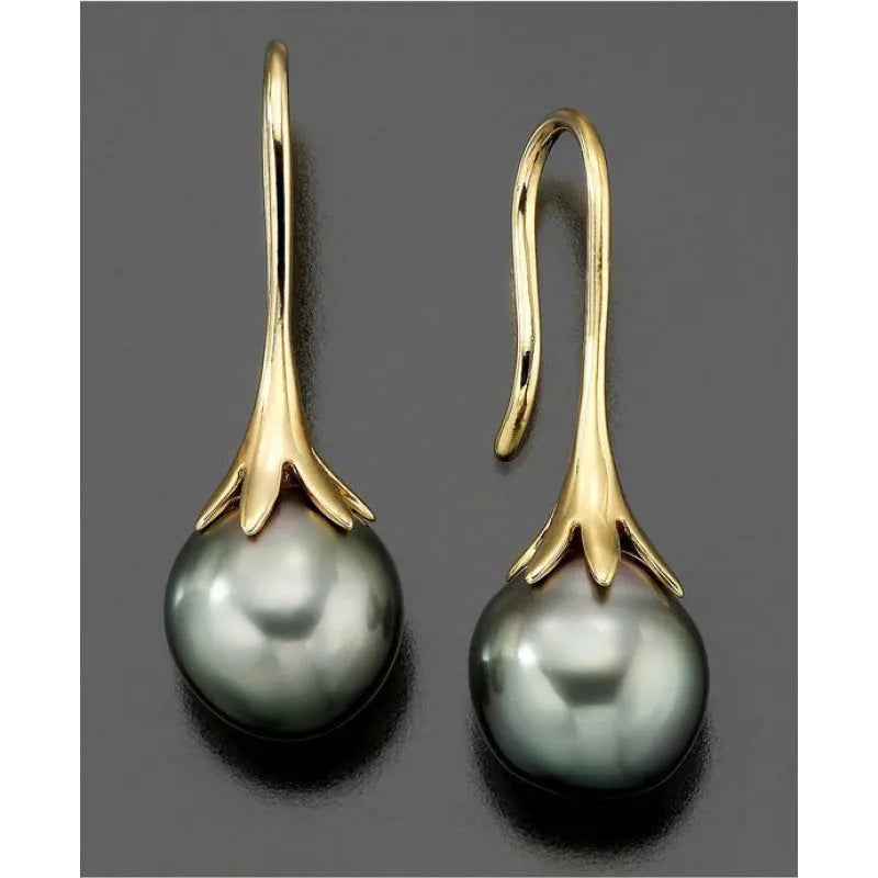 A pair of retro-style women's earrings with an electroplated imitation gold finish