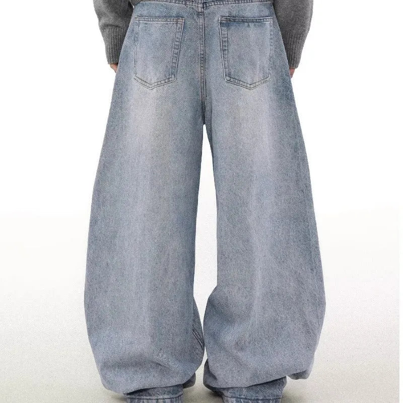 Men's blue retro washed distressed straight-leg cotton denim jeans with a mid waist.
