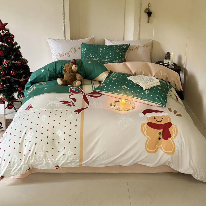 Christmas cartoon print bedding four-piece set on a bed, showing duvet cover and pillowcases.