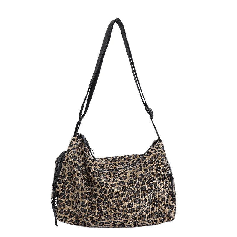 Leopard print sports style shoulder messenger bag with striped lining and stitching details