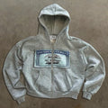 Unisex hooded zip jacket with front pocket in black, grey or pink colours