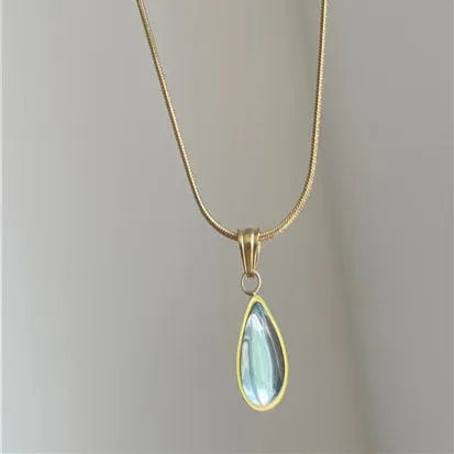 Retro water drop necklace with mixed gem inlaid pendant on a titanium steel snake chain in blue and green colour options.