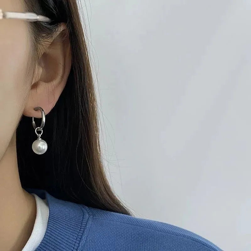 Alloy pearl earrings with geometric round drop design and titanium steel construction