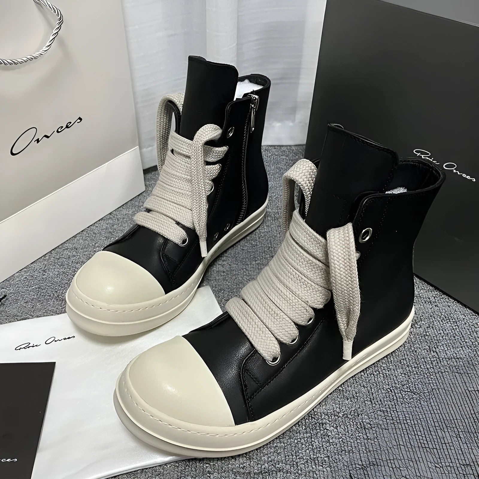 High-top leather sneakers with side zipper in black, creamy white, rose red, and olive green colours