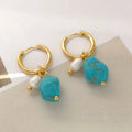 A pair of long and a pair of short geometric clip-on earrings with turquoise and cultured pearls.