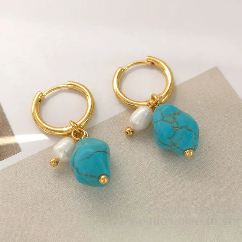 A pair of long and a pair of short geometric clip-on earrings with turquoise and cultured pearls.