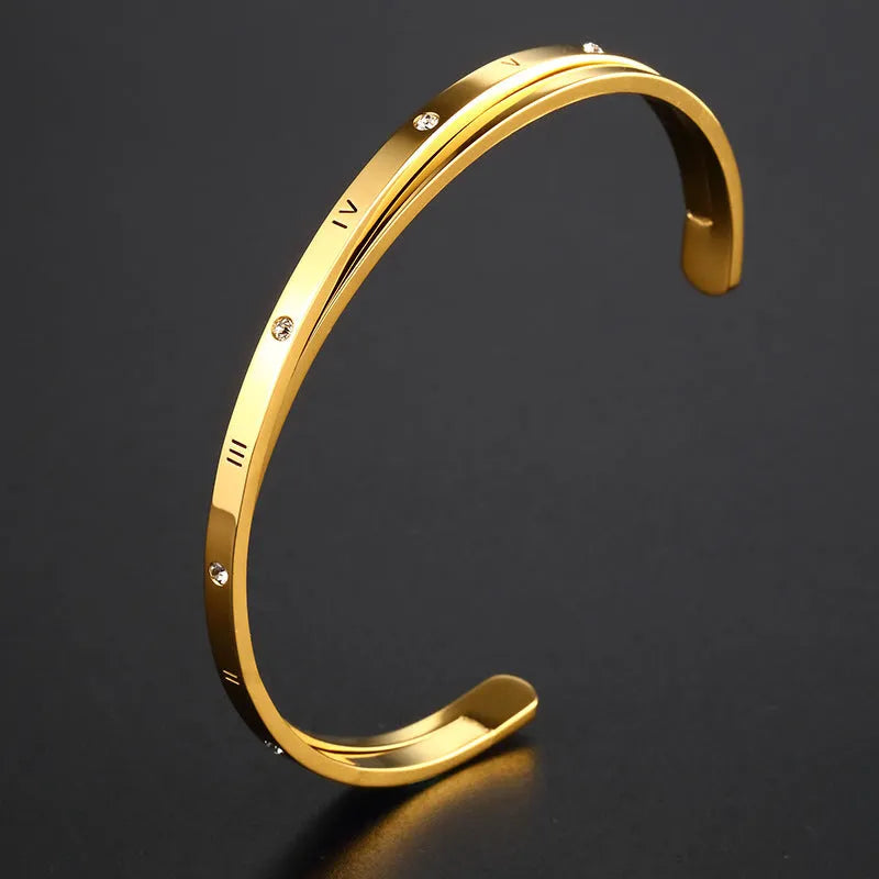 Open-ended stainless steel bracelet with zircon detailing showing rose gold, gold and steel colour options