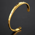 Open-ended stainless steel bracelet with zircon detailing showing rose gold, gold and steel colour options