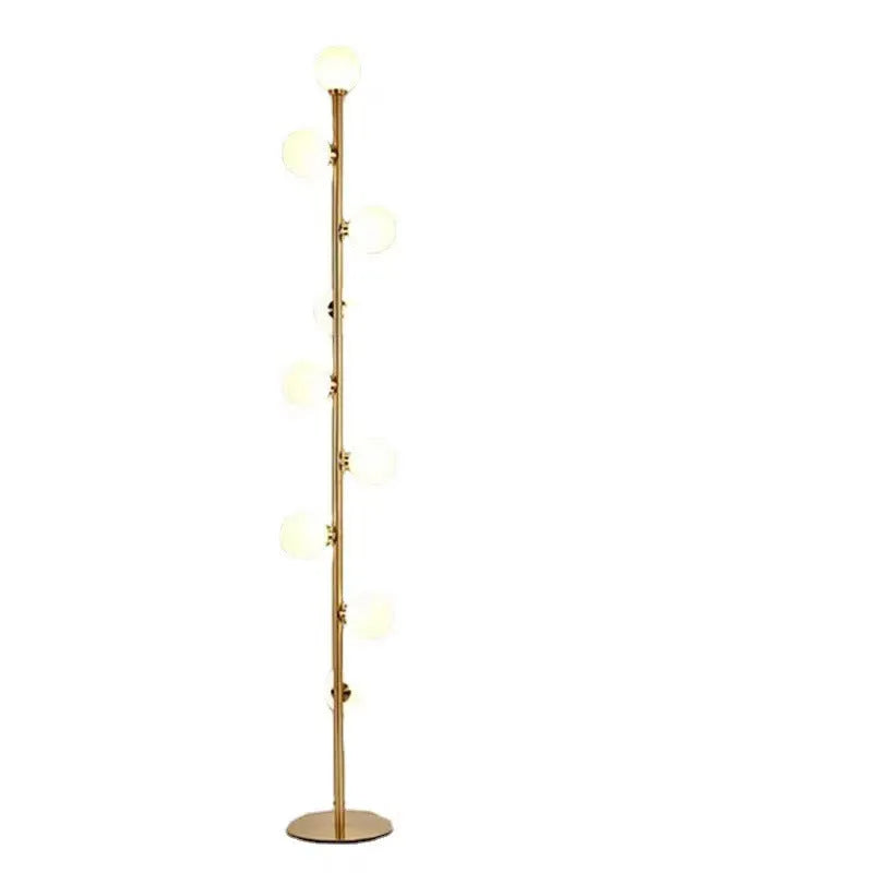 Minimalist modern floor lamp with wrought iron and glass construction, marble base, and adjustable light colours.