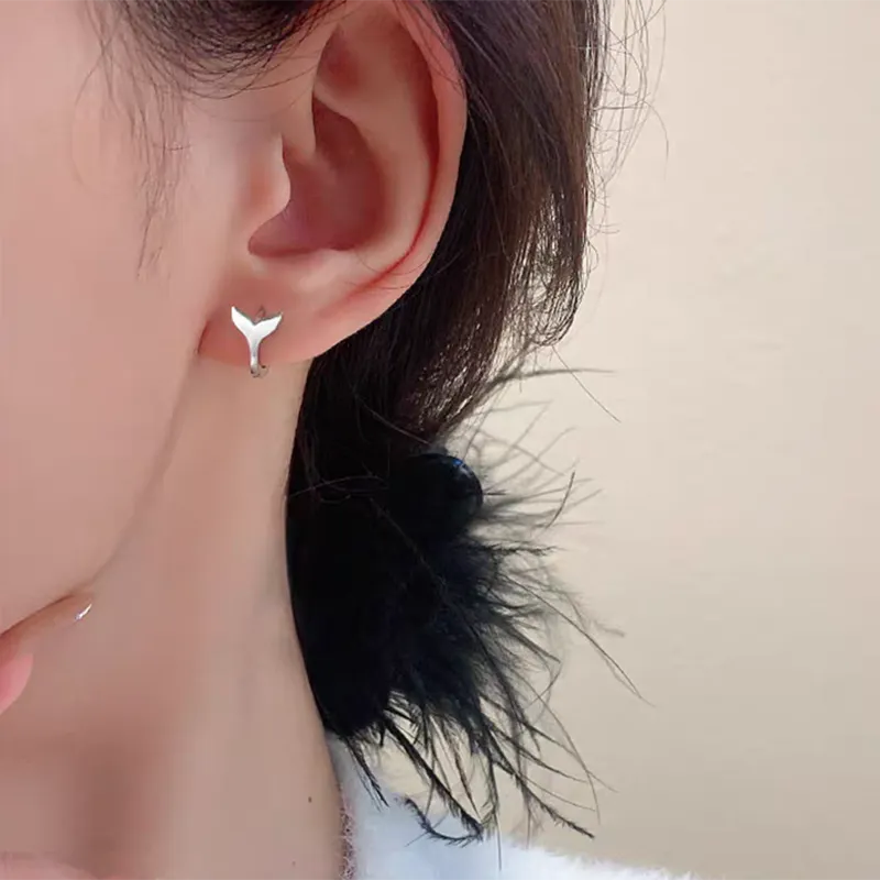 Women's fishtail earrings in copper with electroplated gold finish, simple all-match design