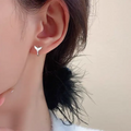 Women's fishtail earrings in copper with electroplated gold finish, simple all-match design